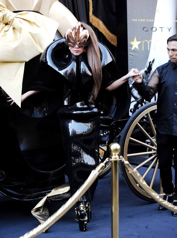 Singer Lady Gaga arrives at Macy's Herald Square by horse-drawn carriage to launch her Lady Gaga Fame fragrance, in New York.