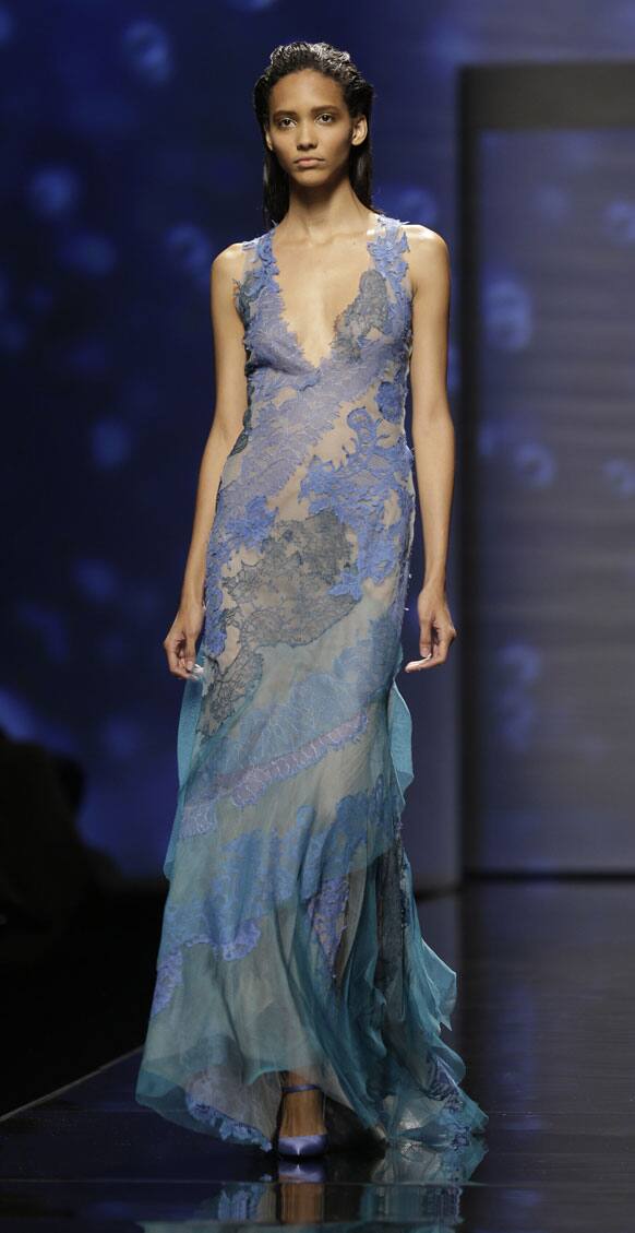 A model wears a creation part of the Alberta Ferretti women's Spring-Summer 2013 collection that was presented in Milan.