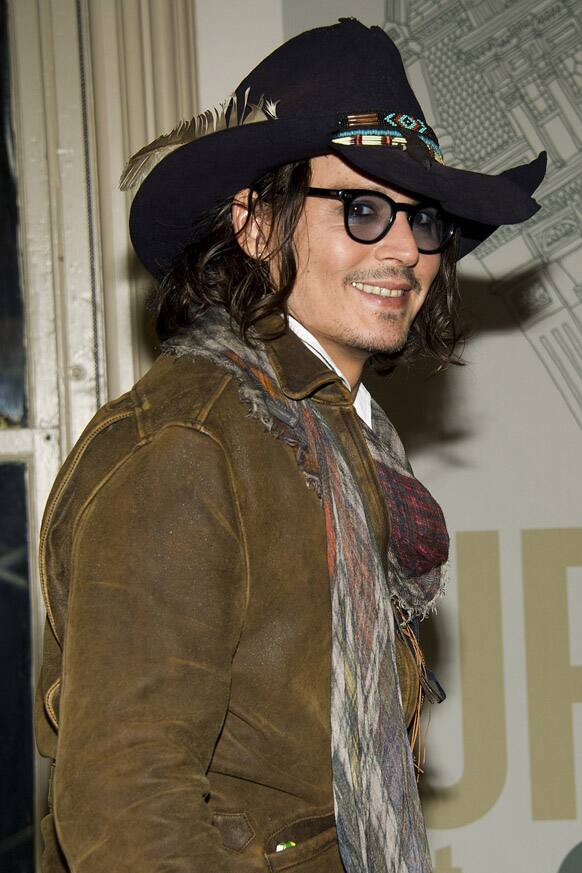 Johnny Depp appears at a promotion book event for Damien Echols's biography 