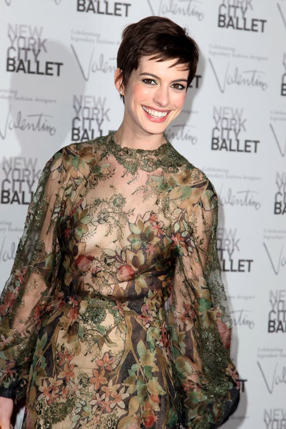 Anne Hathaway arrives at the New York City Ballet Fall Gala honoring fashion designer Valentino Garavani at Lincoln Center in New York. 