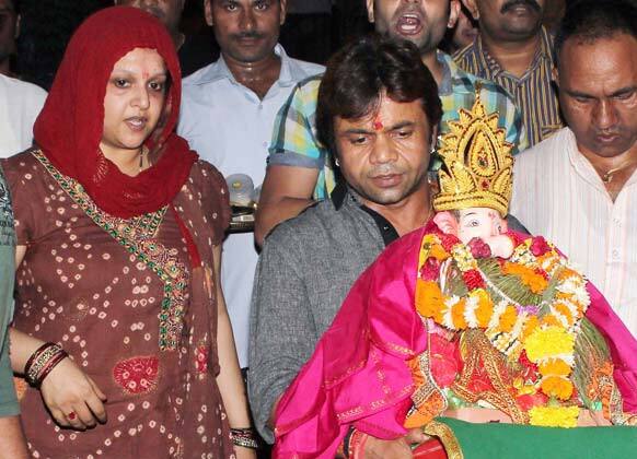 Rajpal Yadav and his wife during Ganesh visarjan.