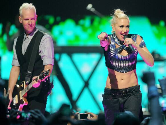 Gwen Stefani and Tom Dumont of No Doubt perform at the iHeart Radio Music Festival, at the MGM Grand Arena in Las Vegas.