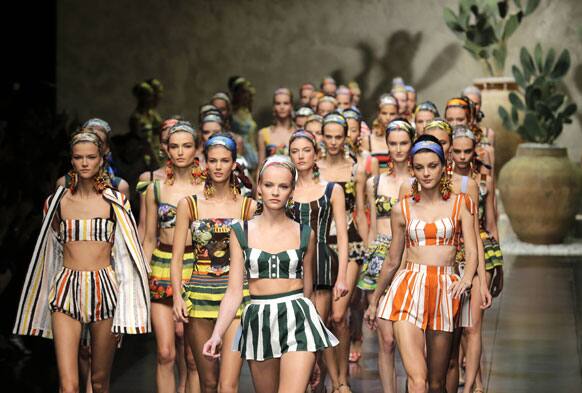 Models wear creations part of the Dolce & Gabbana women's Spring-Summer 2013 fashion collection, during the fashion week in Milan.