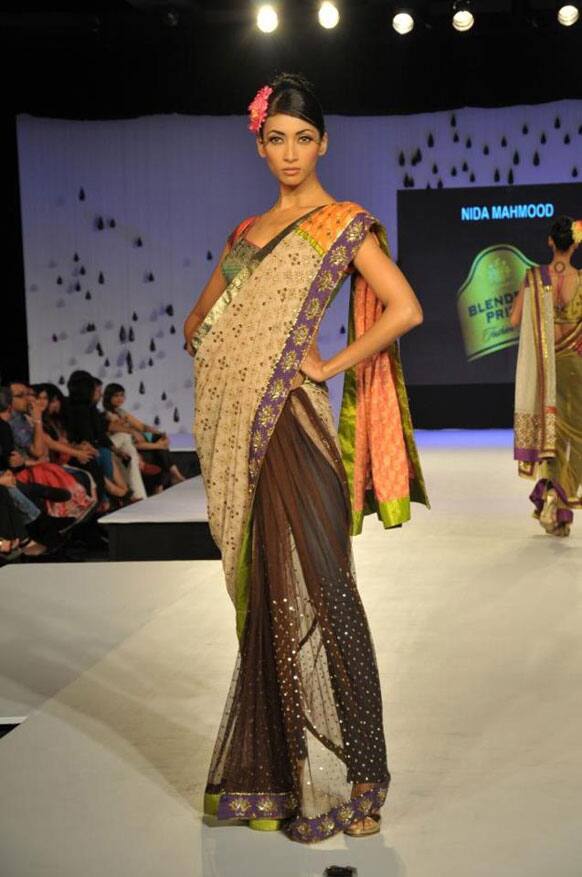 A model displays a creation by designer Nida Mahmood.