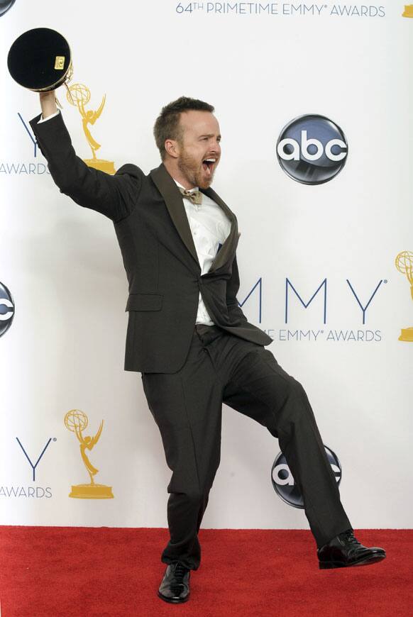 Actor Aaron Paul, winner, Outstanding Supporting Actor In A Drama Series for ‘Breaking Bad’, poses backstage at the 64th Primetime Emmy Awards at the Nokia Theatre, in Los Angeles.