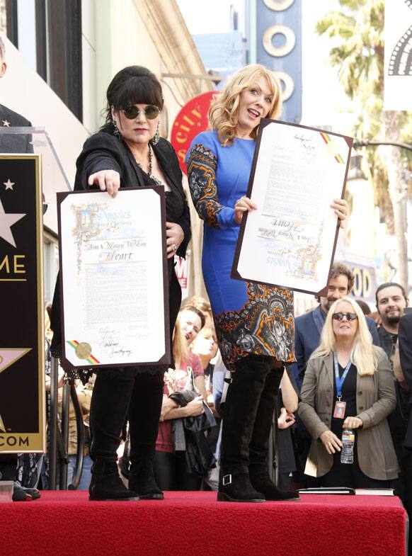 Ann Wilson and Nancy Wilson, of the musical group Heart, receive a star on the Walk of Fame in Los Angeles.