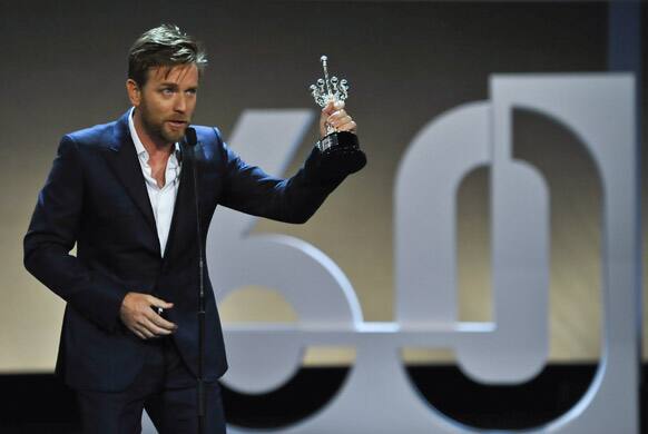 Scottish actor Ewan McGregor, celebrates with the Special Donostia Award, at the 60th San Sebastian Film Festival, in San Sebastian northern Spain.