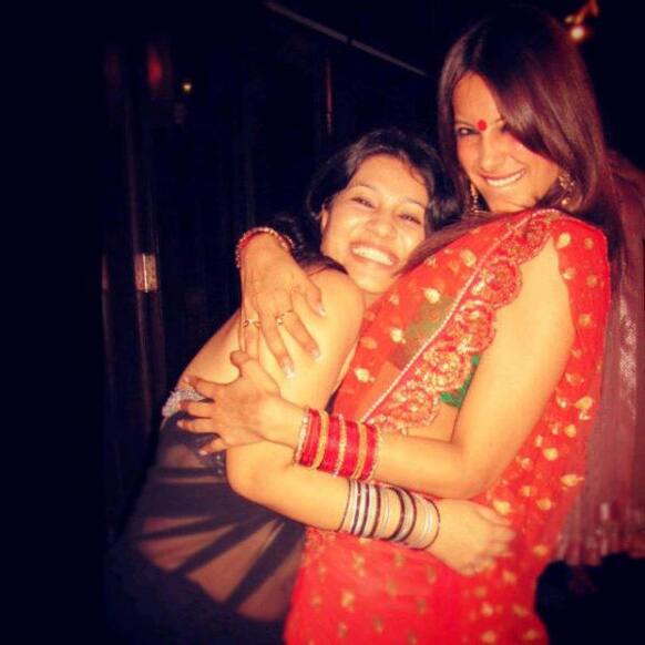 Bipasha Basu strikes a candid pose with her sister Bidisha.