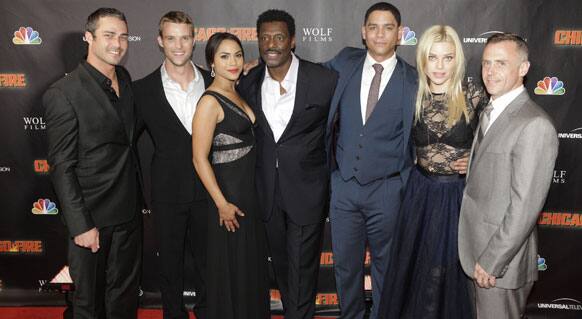 Cast members, from left, Taylor Kinney, Jesse Spencer, Monica Raymund, Eamonn Walker, Charlie Barnett, Lauren German, and David Eigenberg at the world premiere of the new NBC series 