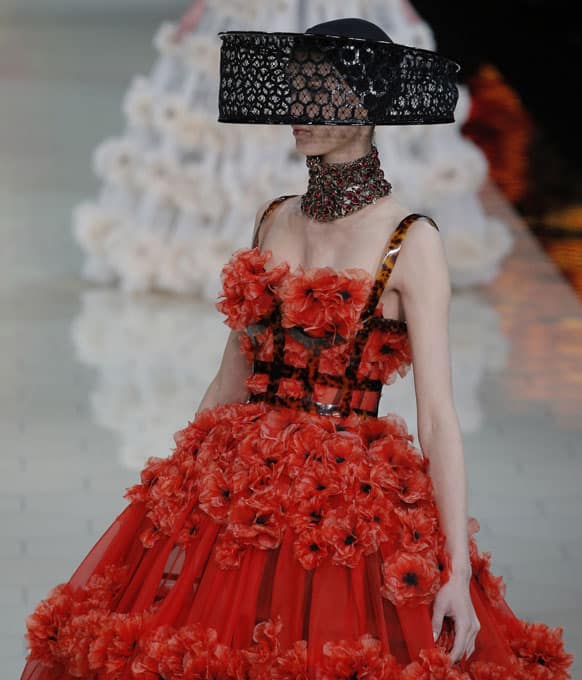 A model wears a creation by British designer Sarah Burton for Alexander McQueen as part of the ready to wear Spring-Summer 2013 collection, in Paris.