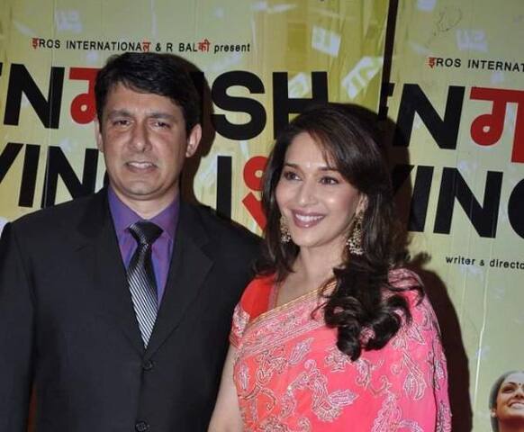 Madhuri Dixit and her husband Dr Sriram Nene pose for the media at the 'English Vinglish' premire. Pic Courtesy: Pinkvilla.