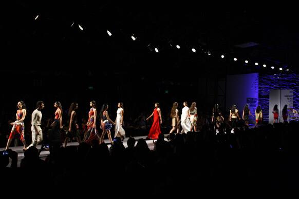 Models display creations by Atsu Sekhose during the Wills Lifestyle India Fashion Week in New Delhi.