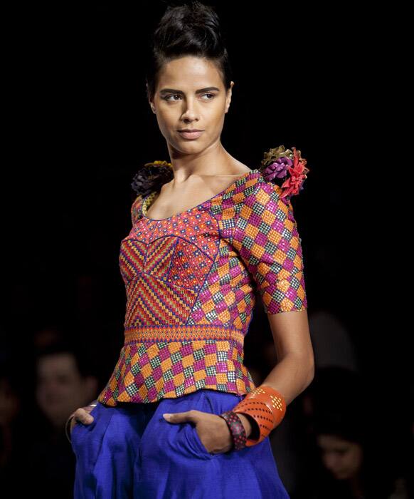 A model displays a creation by Payal Pratap during the Wills Lifestyle India Fashion Week in New Delhi.