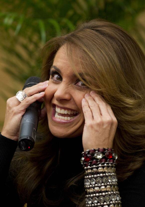 Mexican singer and actress Lucero gestures during a press conference in Mexico City.