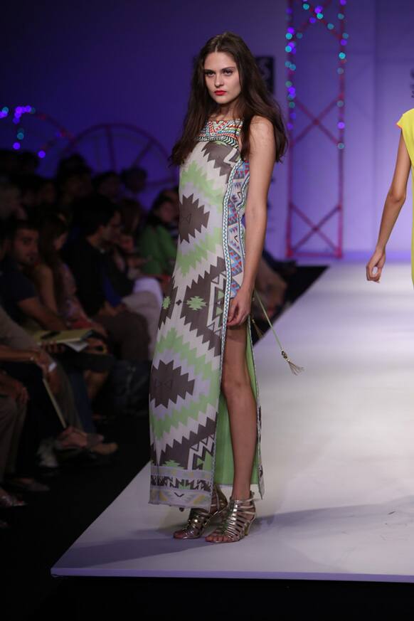 A model displays a creation by designer Surily.