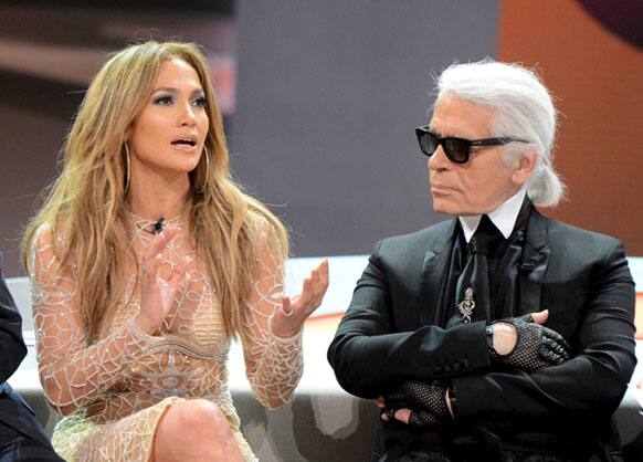 German fashion designer Karl Lagerfeld and US singer Jennifer Lopez during the German TV game show 