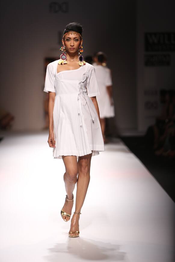 A model displays a creation by Surbhi Chawla. 