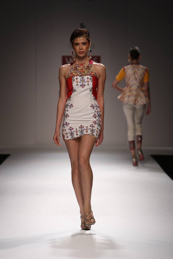 A model displays a creation by Surbhi Chawla.