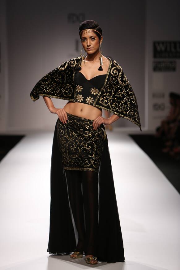 A model displays a creation by Surbhi Chawla.