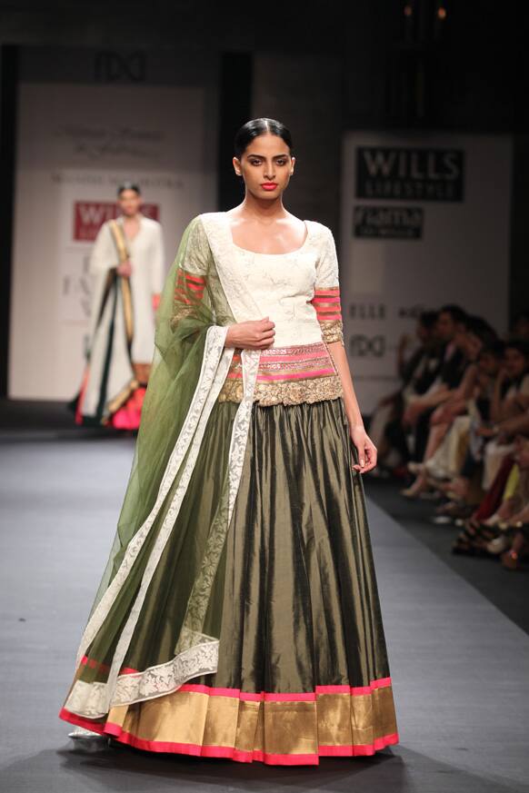 A model shows off a creation by Manish Malhotra.