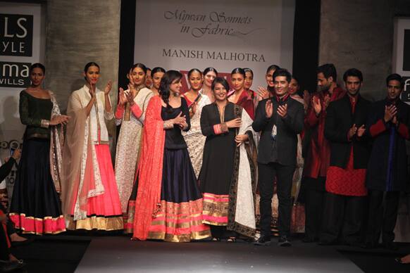 Parineeti Chopra, Shabana Azmi and Manish Malhotra with the models dressed in the designer's creations.