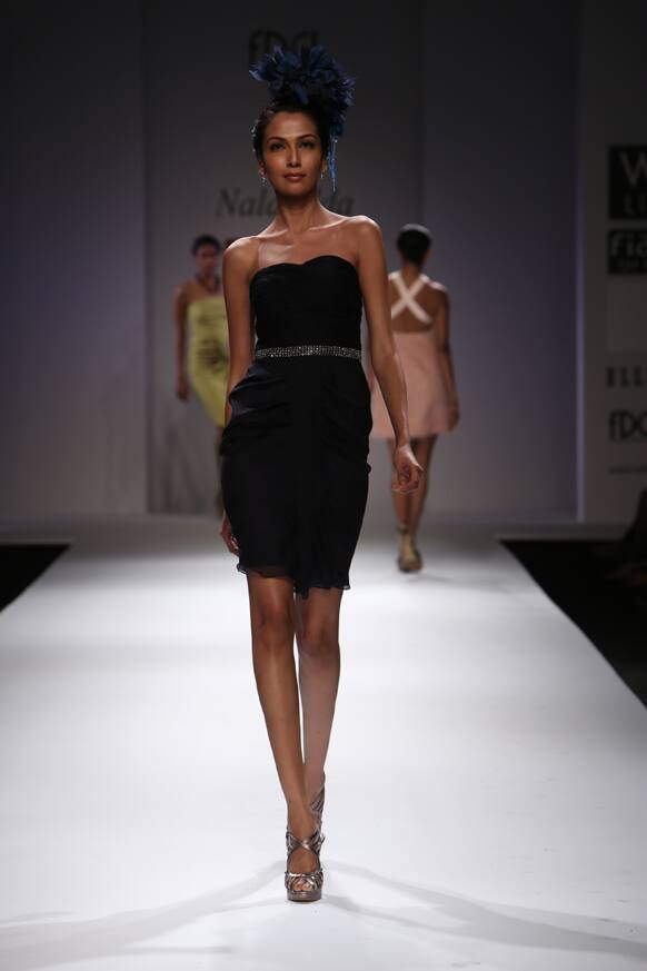 A model walks the ramp at the Nalandda show.