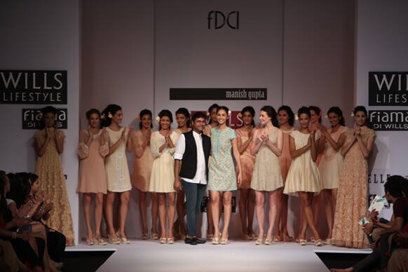 Models with designer Manish Gupta.