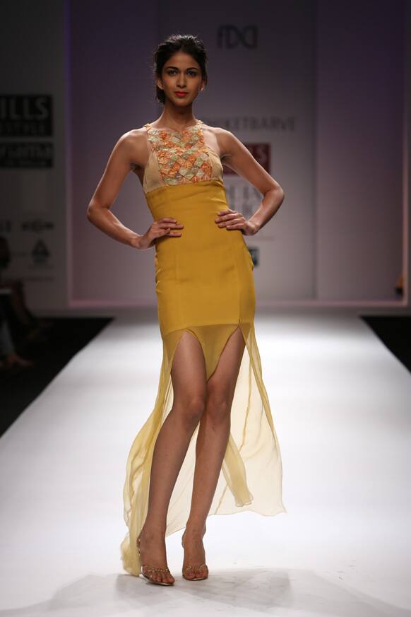 A model displays a creation by designer Nachiket Barve.