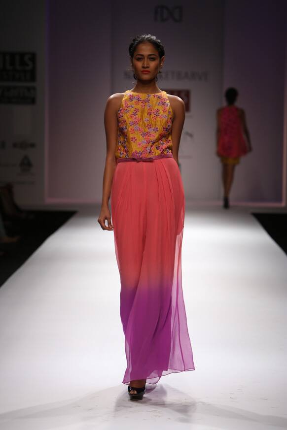 A model displays a creation by designer Nachiket Barve.