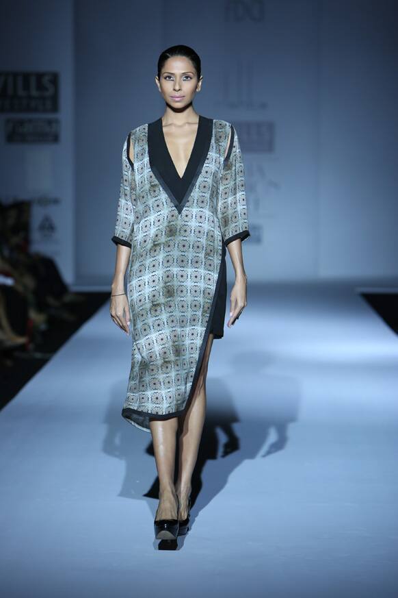 A model displays a collection from designer Arjun Saluja's 'Rishta'.