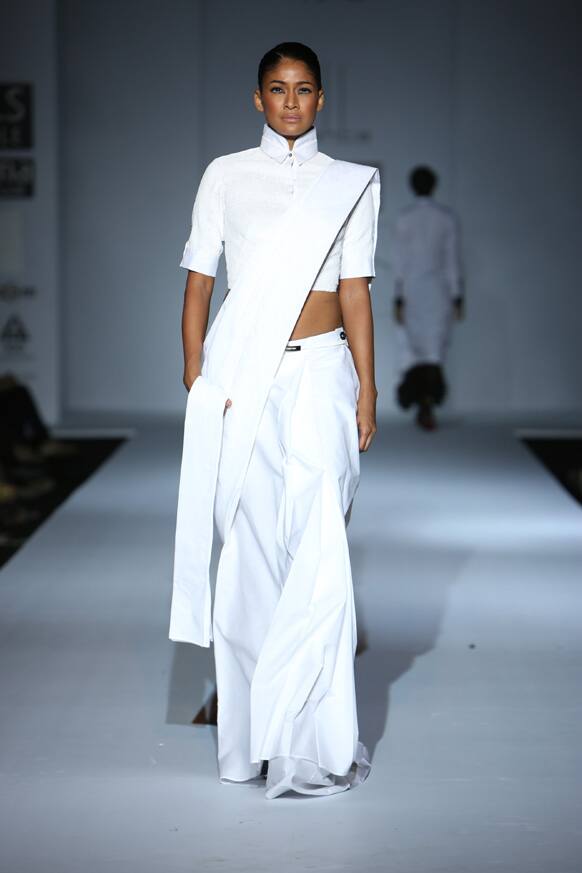 A model displays a collection from designer Arjun Saluja's 'Rishta'.