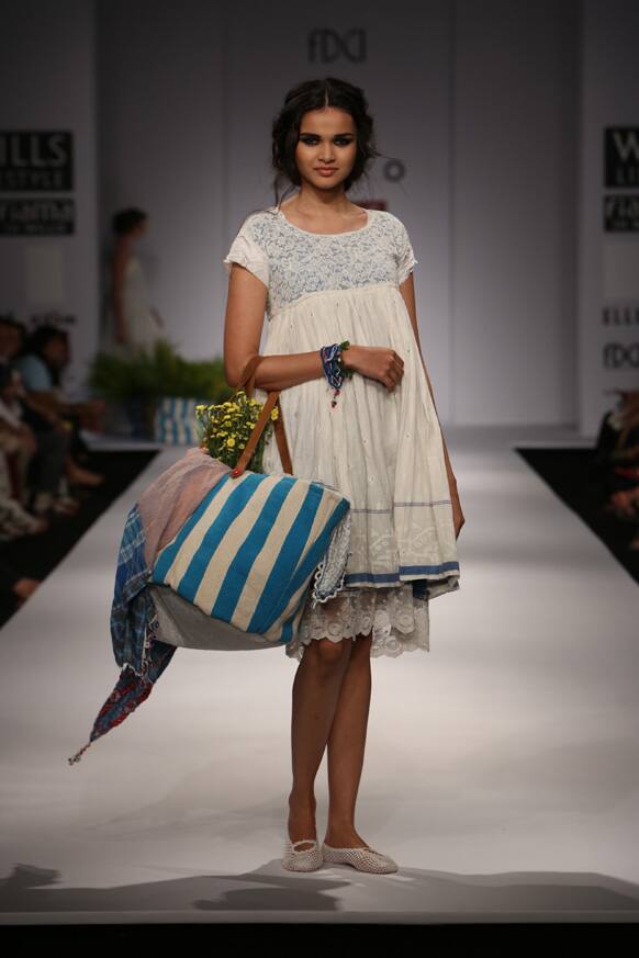 A model displays a creation by Aneeth Arora.