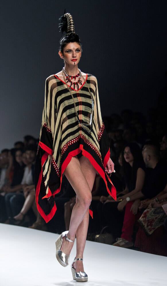 A model displays a creation by Malini Ramani during the Wills Lifestyle India Fashion Week in New Delhi.