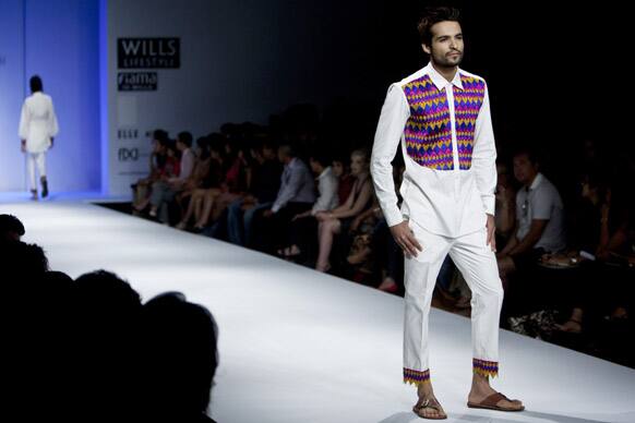 A model displays a creation by Jenjum Gadi during the Wills Lifestyle India Fashion Week in New Delhi.