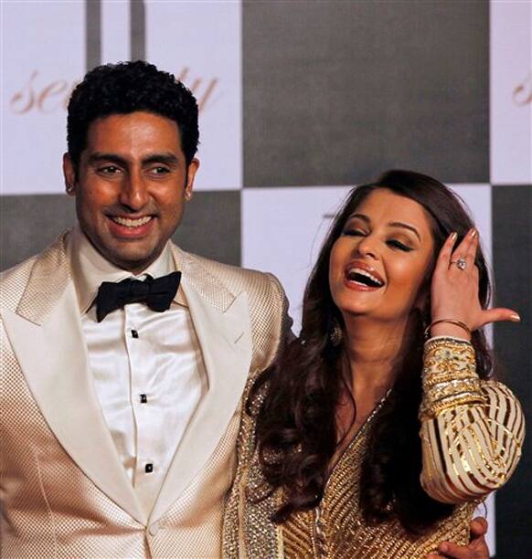 Abhishek Bachchan and his wife Aishwarya Rai-Bachchan attend a party to celebrate the 70th birthday of Bachchan's father Amitabh Bachchan in Mumbai.