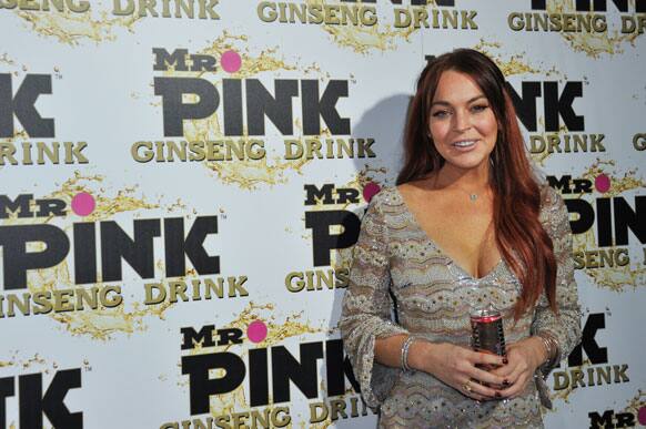 Lindsay Lohan attends the Mr. Pink Ginseng launch party at the Beverly Wilshire hotel, in Beverly Hills, Calif.