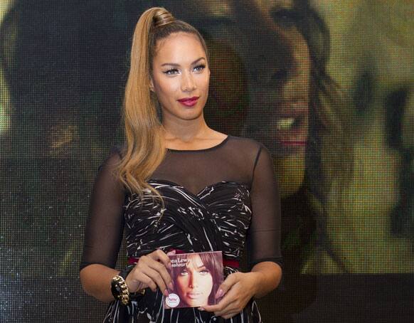 British singer Leona Lewis stands with her new album 