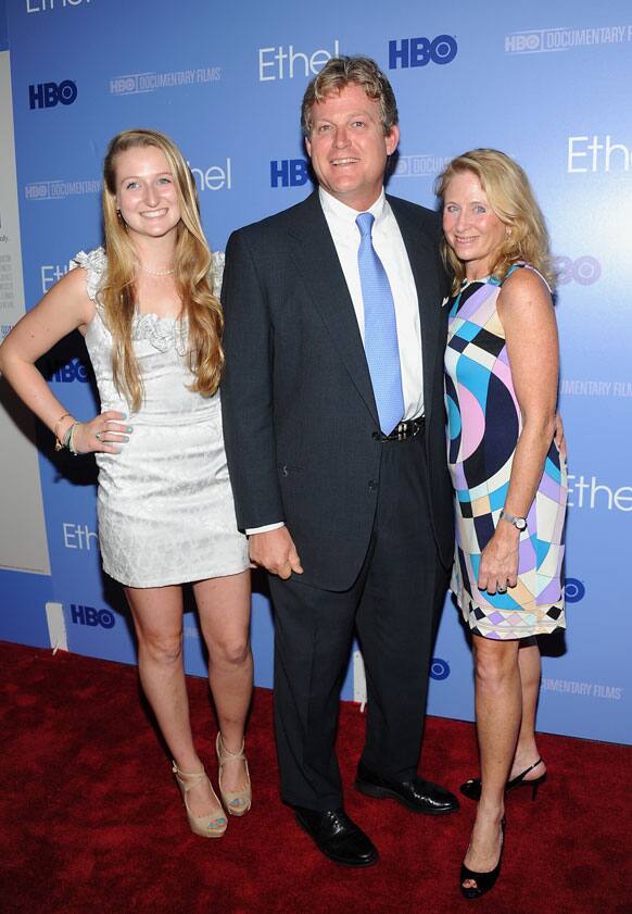 Edward M. Kennedy Jr. poses with his wife Kiki and daughter Kiley attend the premiere of the HBO documentary 