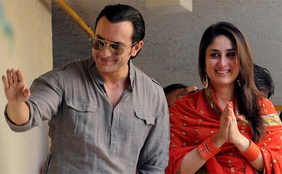 The newest married couple in B-Town, Saif Ali Khan and Kareena Kapoor, wave to the gathering outside their house.