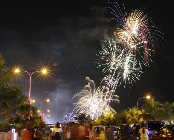 Fireworks light up the sky to welcome in the New Year, at the scenic Manila Bay in Manila, Philippines.
