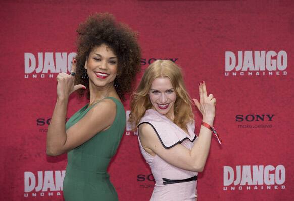 German actress Julia Dietze, right, arrives with her friend Nathalie Nowak for the German premiere of the movie