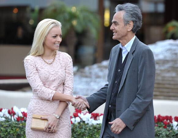 Miss Golden Globe Francesca Eastwood and Dick Clark Productions CEO Allen Shapiro attend the red carpet roll out at the Golden Globe Awards preview day at the Beverly Hilton Hotel, in Beverly Hills, Calif.