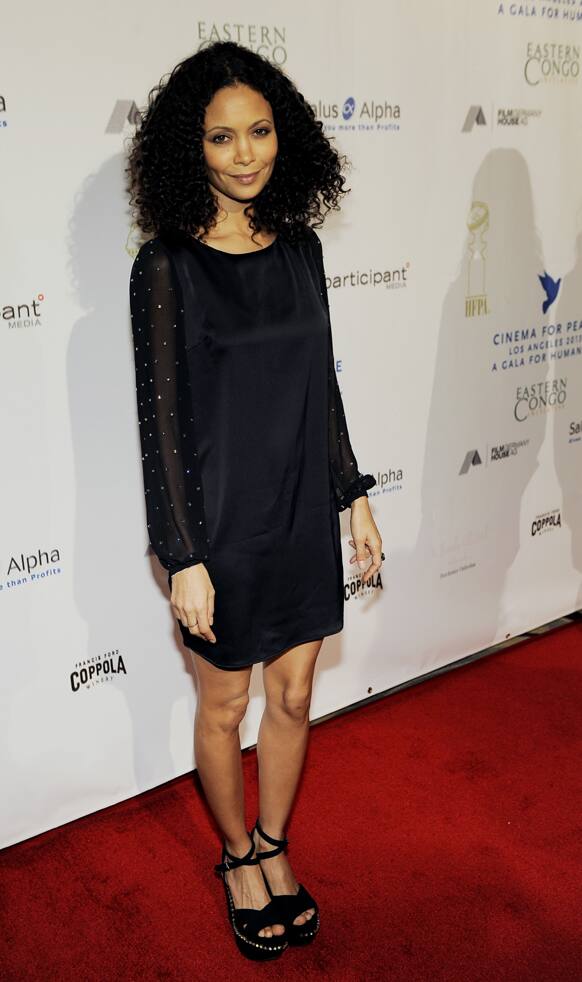 Actress Thandie Newton poses at the Cinema For Peace Foundation's 2013 Gala for Humanity at the Beverly Hills Hotel, in Beverly Hills, Calif.