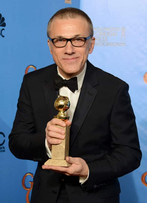 Christoph Waltz poses with the award for best performance by an actor in a supporting role in a motion picture for “Django Unchained” backstage at the 70th Annual Golden Globe Awards at the Beverly Hilton Hotel .