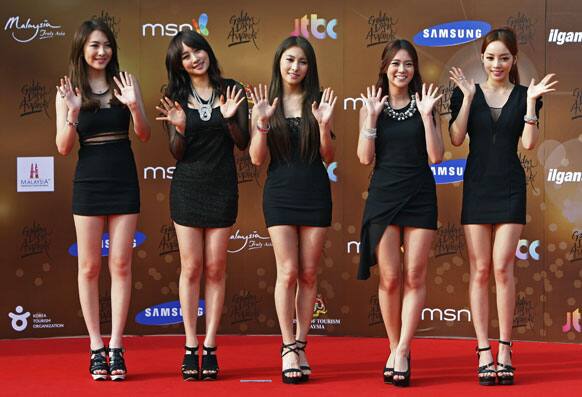 South Korean girl group Kara pose for photographers as they arrive on the red carpet ahead of the 27th Golden Disk Awards in Sepang, Malaysia.