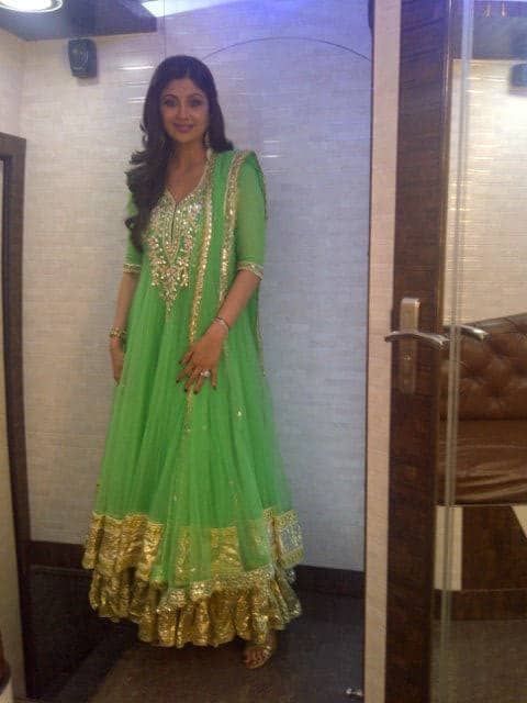 Shilpa Shetty asked he fans on Twitter to tell her how she looked in the bright green Anarkali dress and wrote,