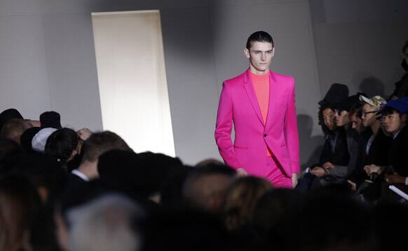A model presents a creation by fashion designers Nicola Formichetti and Romain Kremer for Thierry Mugler's men's fall-winter 2013/2014 fashion collection, presented in Paris.