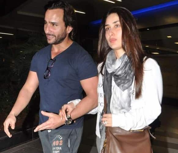 Gorgeous couple Kareena and Saif were seen walking hand-in-hand at the Mumbai airport post landing from a trip to Dubai/UK. (Pic courtesy: Pinkvilla)