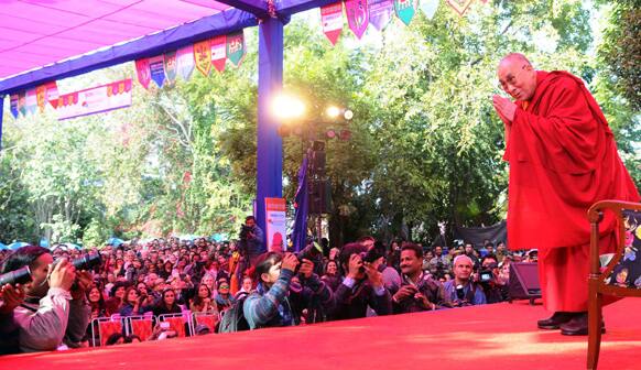 Urging the people to follow a non-violent path, the Dalai Lama said that the 21st century is the age of dialogue and not violence.