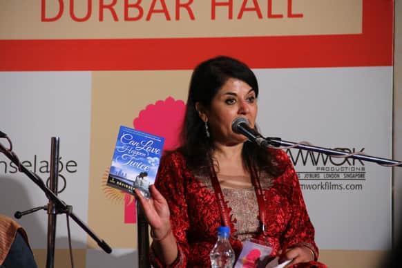 Author cum session moderator Kishwar Desai introducing Ravinder Singh to talk titled 'All the Glitters: Stories of Love and Lust'.